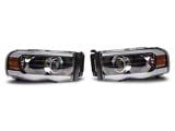 Raxiom Axial Series Proejctor Headlights with Sequential LED Bar; Black Housing; Clear Lens (02-05 RAM 1500)