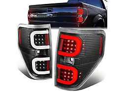 Dual C-Bar LED Tail Lights; Black Housing; Clear Lens (09-14 F-150 Styleside)