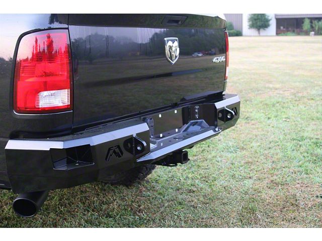 Fab Fours Premium Rear Bumper; Not Pre-Drilled for Backup Sensors; Bare Steel (09-18 RAM 1500 w/ Factory Dual Exhaust)