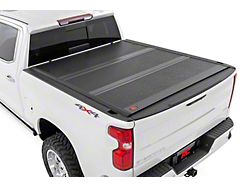 Rough Country Hard Low Profile Tri-Fold Tonneau Cover (14-18 Sierra 1500 w/ 5.80-Foot Short Box & Bed Rail Caps)