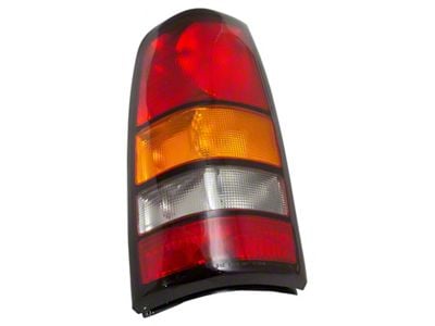 Tail Light; Chrome Housing; Red Clear Lens; Driver Side (04-06 Sierra 1500)