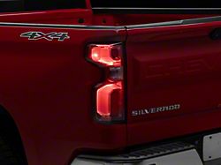 OEM Style Tail Light; Black Housing; Red/Clear Lens; Driver Side (19-23 Silverado 1500 w/ Factory LED Tail Lights)