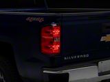 OEM Style Tail Light; Black Housing; Red/Clear Lens; Driver Side (14-18 Silverado 1500 w/ Factory Halogen Tail Lights)