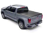 UnderCover Triad Hard Folding Tonneau Cover (19-25 Sierra 1500 w/ 5.80-Foot Short & 6.50-Foot Stanard Box)