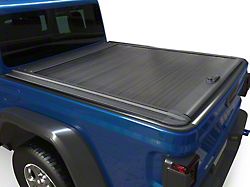 Retractable Tonneau Cover; Black (09-25 RAM 1500 w/ 5.7-Foot Box & w/o RAM Box)